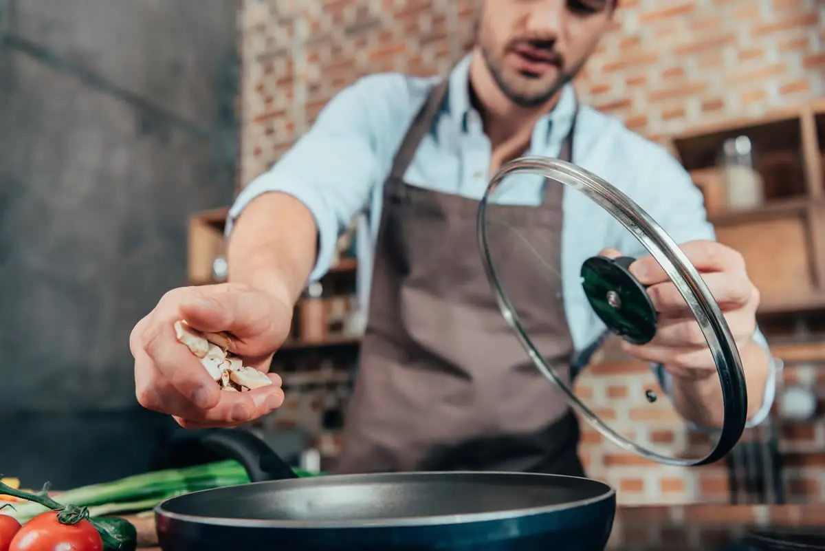Cooking with a skillet in the kitchen
