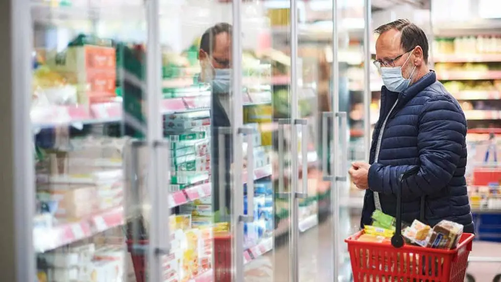 man grocery shopping