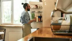 man in kitchen