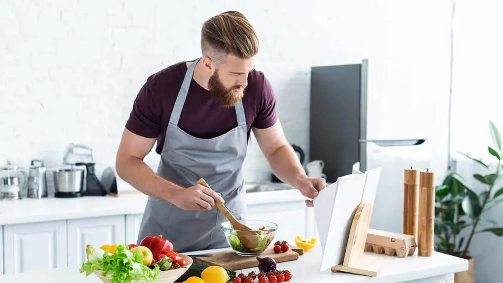 man cooking meal