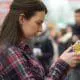 woman shopping canola oil