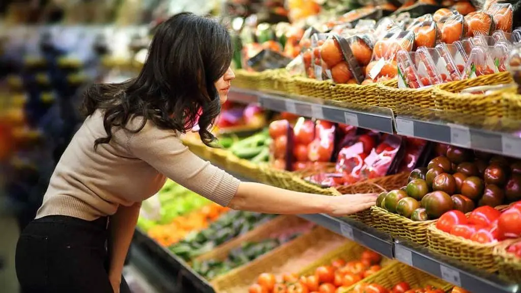 women shopping produce