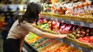 women shopping produce