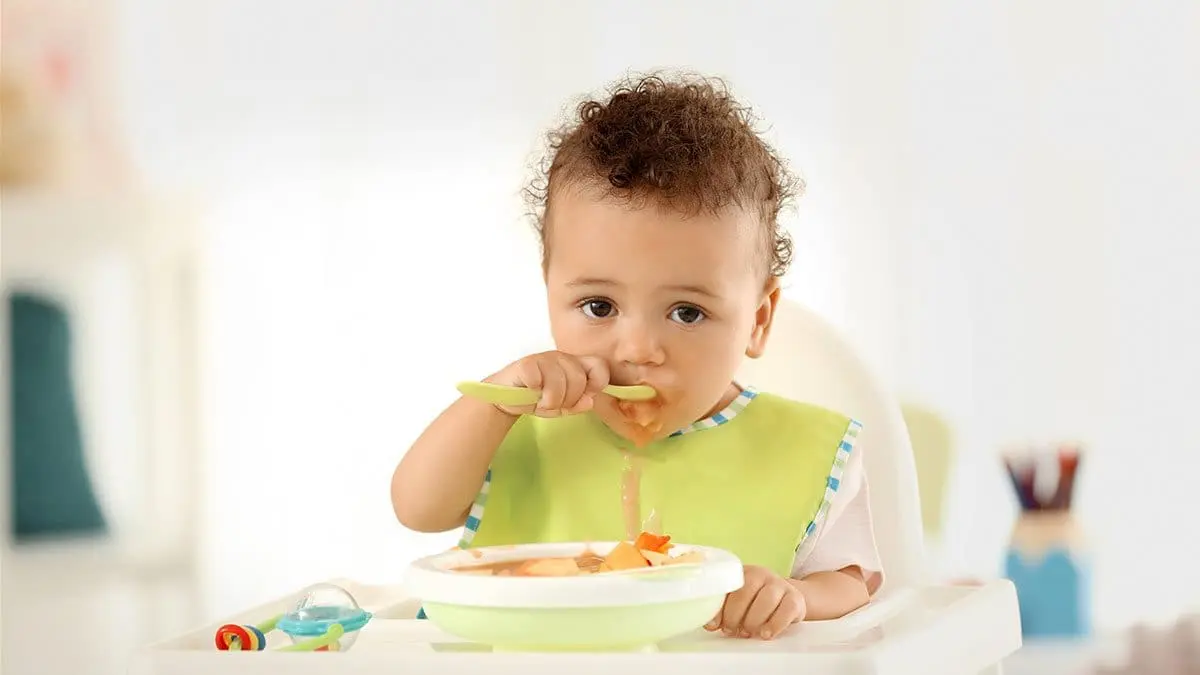 baby eating food