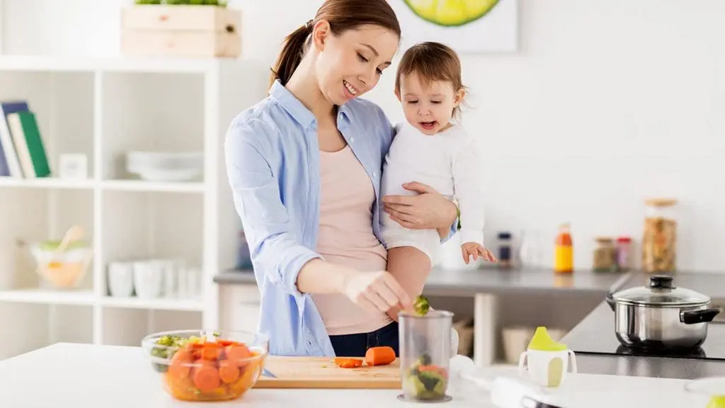 mother making baby food