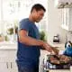 man cooking beef