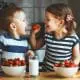 kids eating strawberries