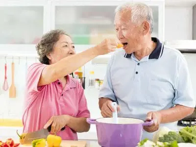 couple eating vegetables