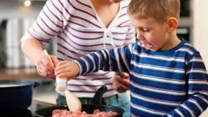 kid cooking beef