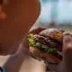 kid eating burger