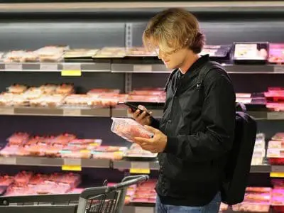man buying meat