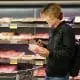 man buying meat