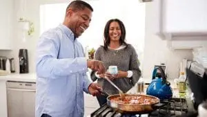 man cooking in kitchen