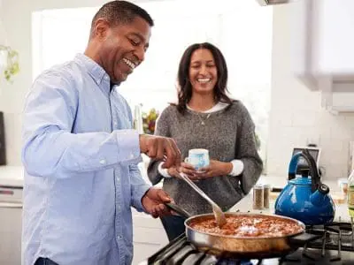 man cooking in kitchen