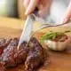 Women-Cutting-Steak