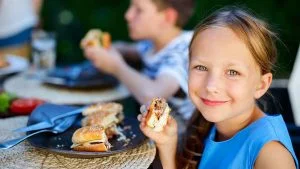 girl eating burger