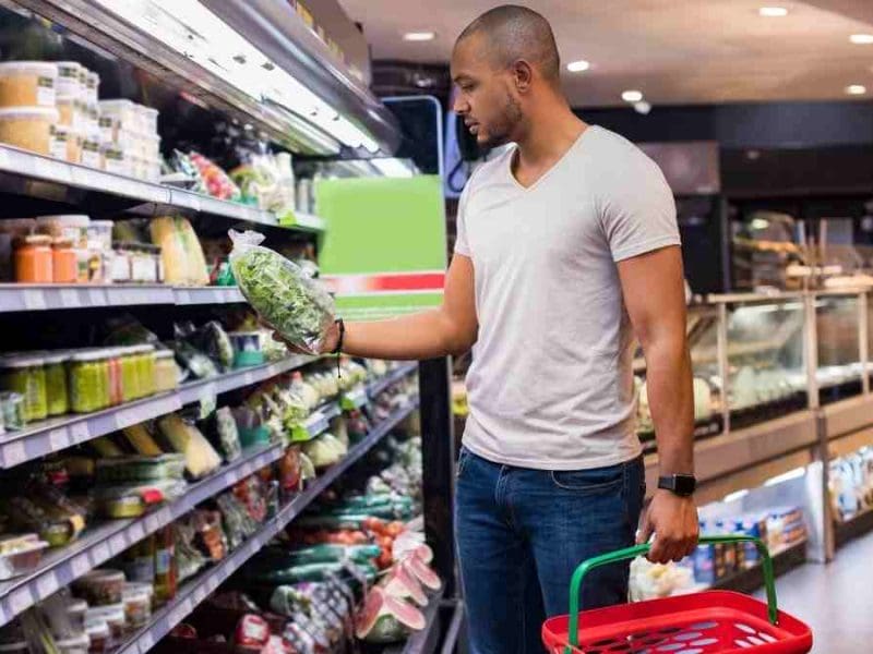 man shopping vegetables
