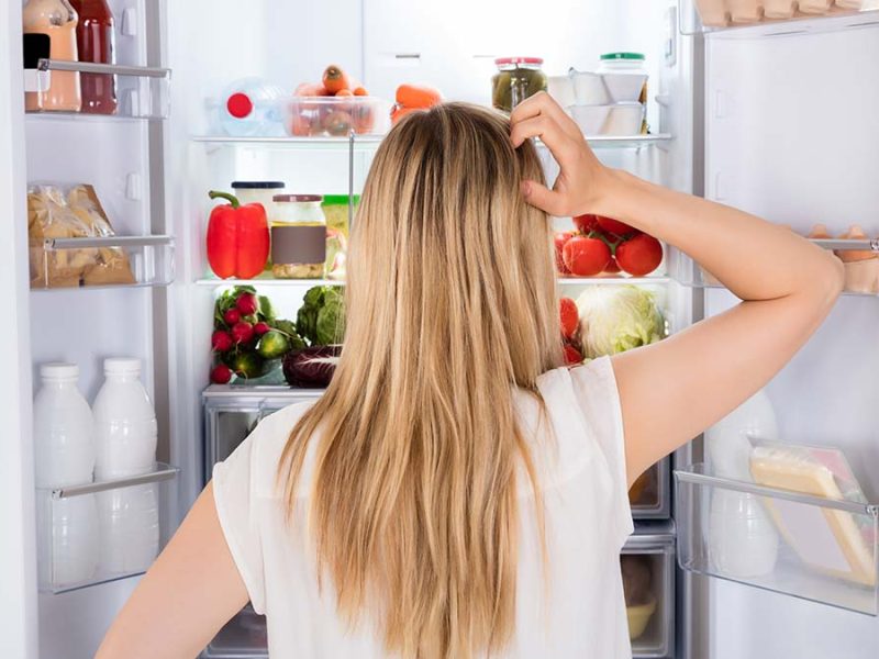 woman-looking-in-fridge