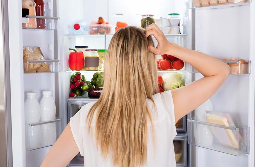 woman-looking-in-fridge