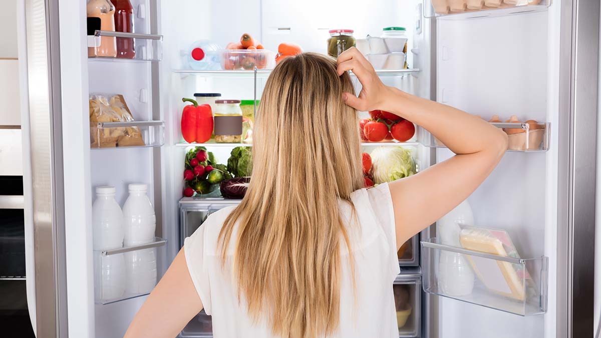 woman-looking-in-fridge