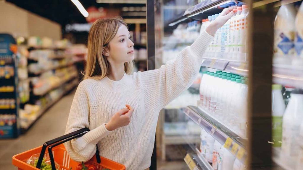 Women-Picking-Milk-Vitamin D