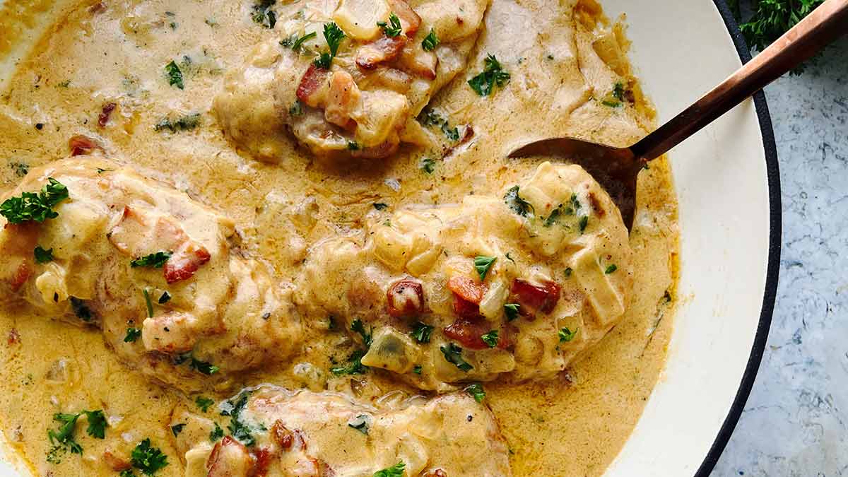 smothered-pork-chops-in-bacon-and-onion-gravy-web